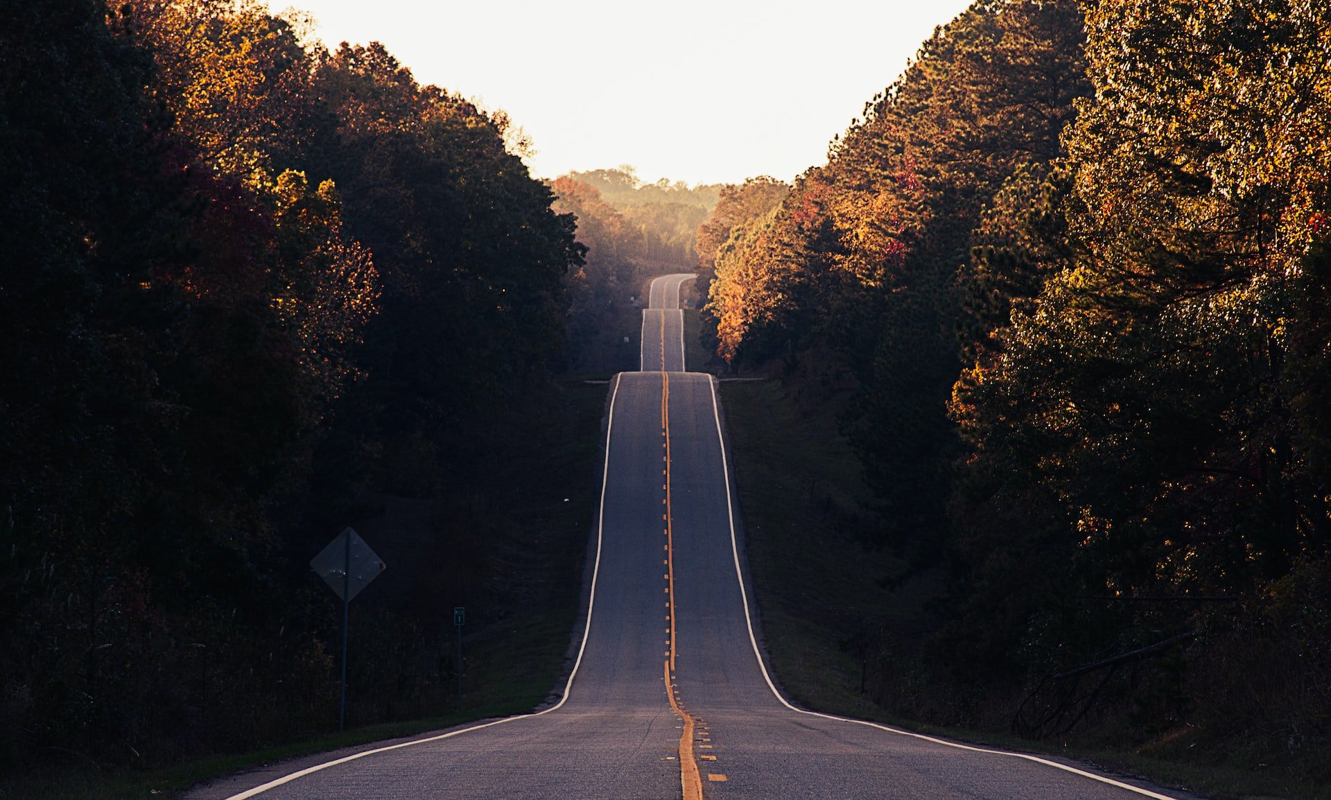 A road with dips over hills.